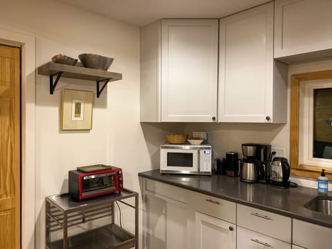 Coffee and tea station stocked with fresh brews, perfect for morning or evening relaxation.