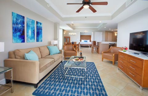 Unwind on the plush sofa in a bright, airy living space.