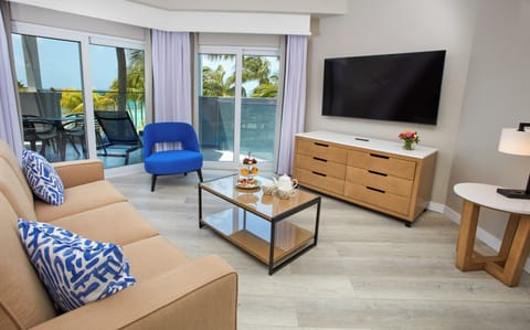 Lounge with ocean breezes and your favorite show nearby.