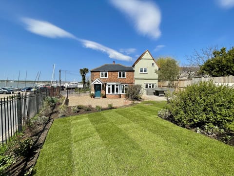 Elmtree Cottage | View of cottage and private driveway from garden