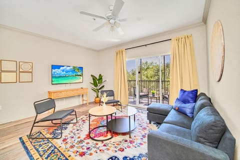 Inviting living room with smart TV and patio access