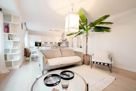 Open living space with unique decor & plants for a splash of green & a cheerful vibe!