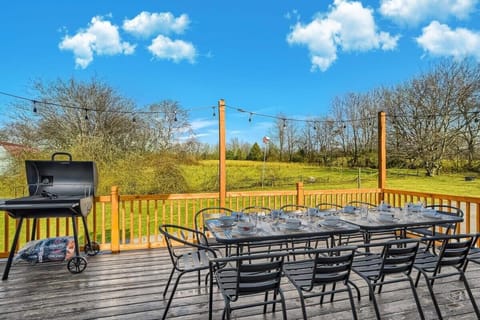 Treat yourself, family, and friends to our 12-person back porch entertainment area and grill some food on the BBQ!