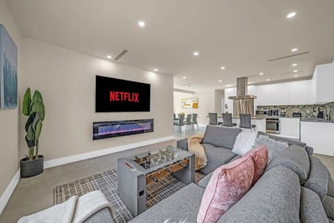 Cozy up on our king sofa and dive into entertainment with the Smart TV in our living room.