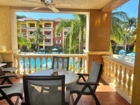 Huge front deck overlooking the pool with partial ocean views