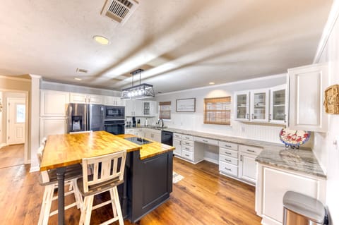 Full kitchen that opens to the dining room and living room