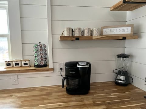 Enjoy fresh coffee and tea with this Keurig machine or a French press 