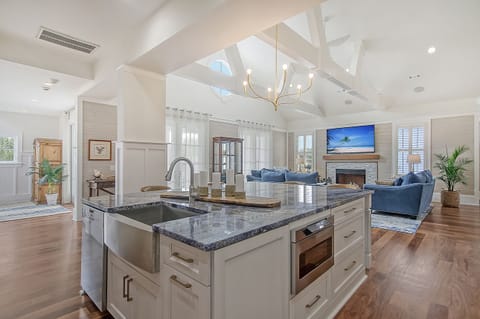 New improved kitchen layout with gorgeous Blue Bahia granite island 