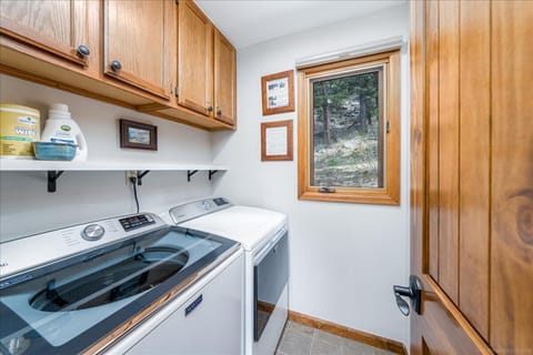 Fully equipped laundry room with space to store your hiking snacks.