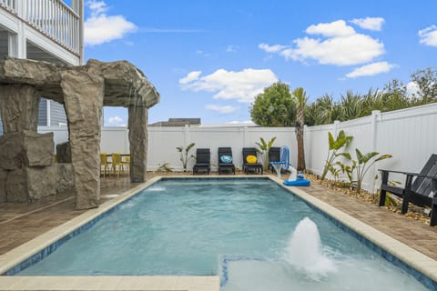 Heated pool w/ waterfall grotto, bubbler,  color-changing lights