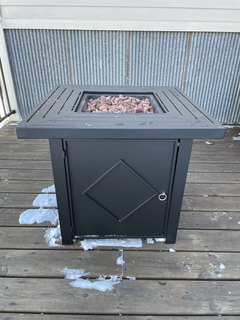 Propane fire pit on deck for guest use. Instructions for use in Welcome Binder
