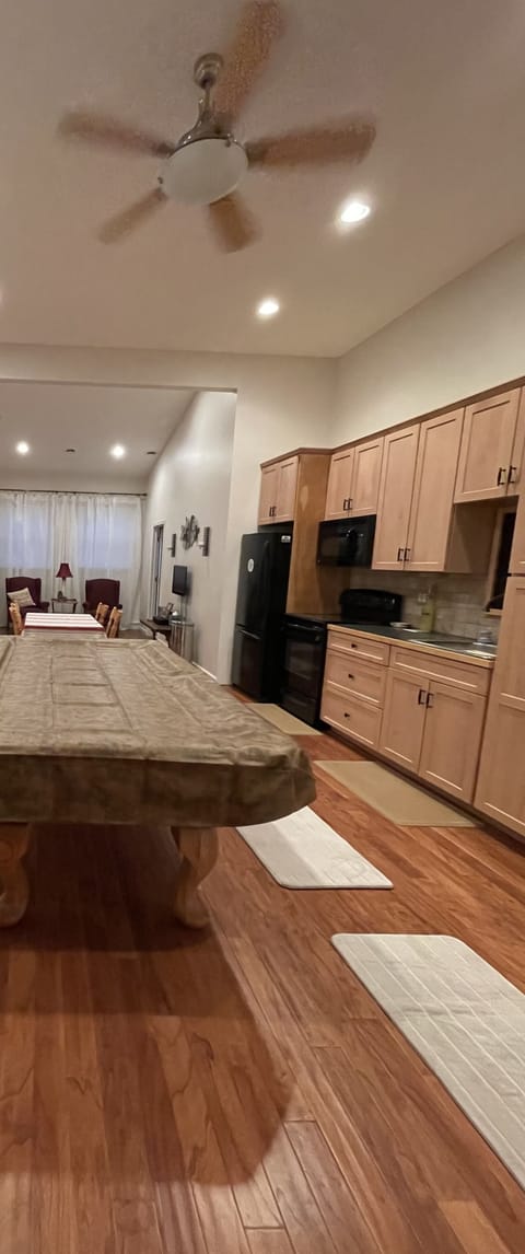 Great room. With pool table. Fully stocked kitchen. Immaculate.