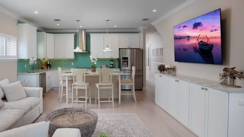 The open concept floor plan flows the living room right into the kitchen...