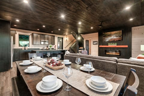 The dining area has plentiful seating for 8, making this cabin perfect to enjoy a home cooked meal after a day hiking the smoky mountain. 