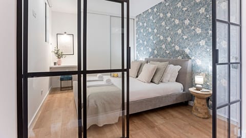 Gorgeous bedroom with sleek glass sliding doors — a modern, stylish retreat designed for effortless comfort.

#modern #stylish #bedroomdesign #lovelystay
