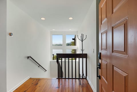 Entry way with 4 bedrooms on main level and game room on lower level.