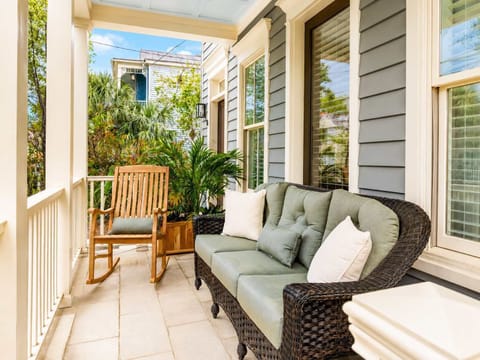 Private Front Porch with Wicker Seating & Teak Rocking Chair Overlooking Historic Spring Street