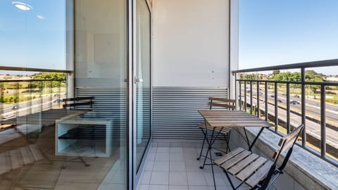 Lovely balcony with some sitting furniture to enjoy a warm summer evening #lovely #practical #airbnbporto