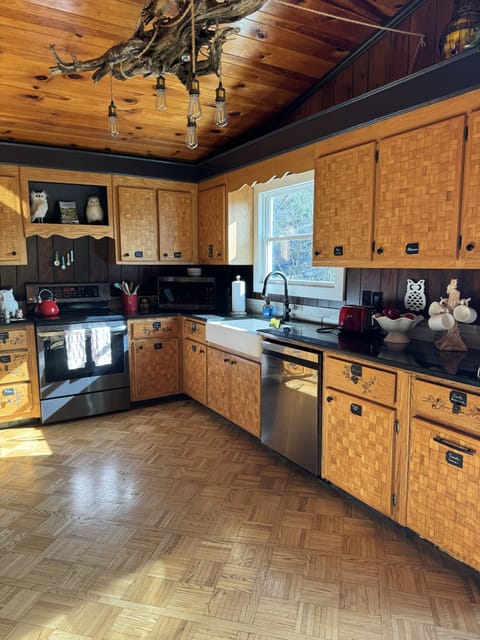 Lots of folks can create meals & memories in this full sized kitchen.