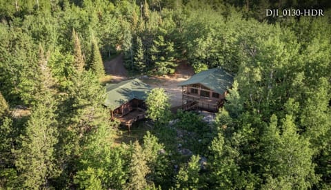 Main Cabin (left) and Guest Cabin over Garage (right)