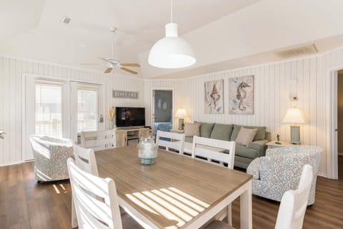 Living room/ Dining area with Queen sleeper sofa. 
