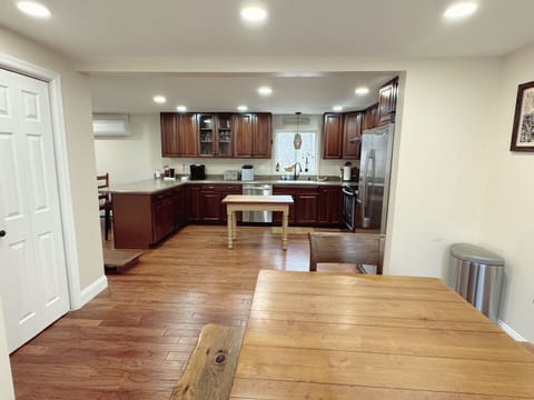 Open concept kitchen that connects the dining room to the family room 