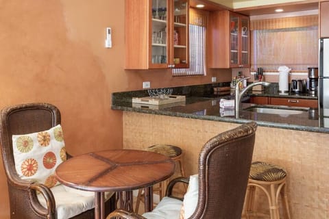Dining table and breakfast seating at the counter