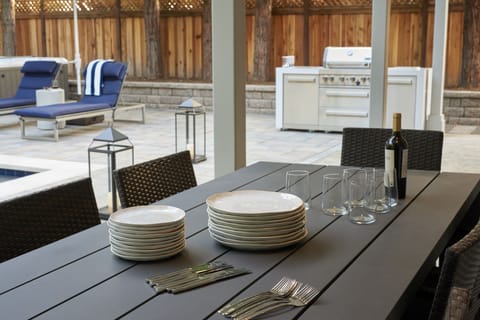 CA living! Two 8-person tables: poolside by redwoods & indoor fireplace.