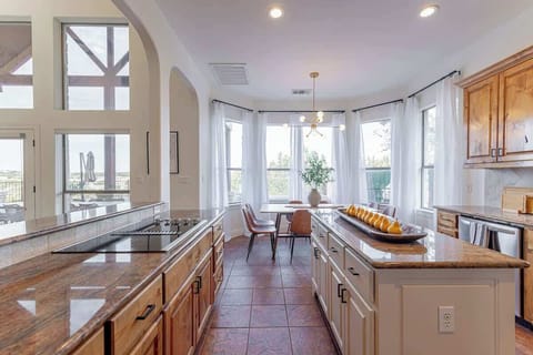 Home chefs will enjoy cooking in the modern kitchen with stainless steel appliances and plenty of counter space.
