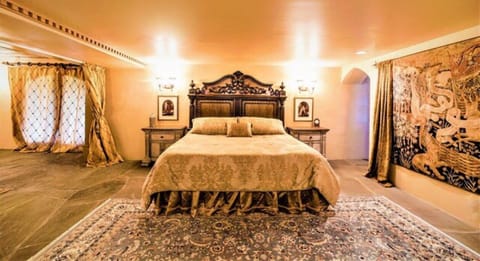'The King's Suite' bedroom with king bed and memory foam mattress