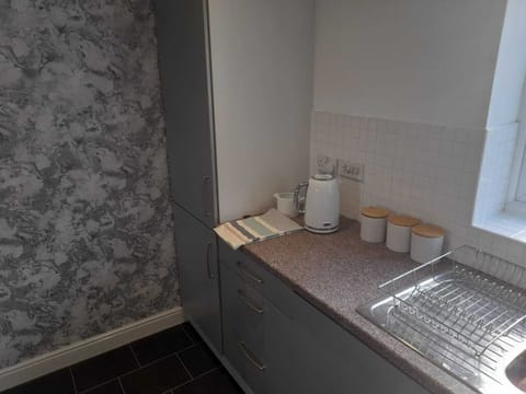 Kitchen area showing Fridge Freezer