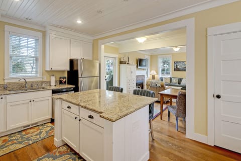 The cozy breakfast bar is perfect for coffee, conversation and quick bites