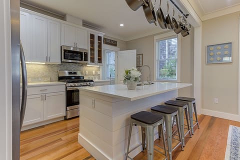 Sip a cup of coffee at the kitchen island