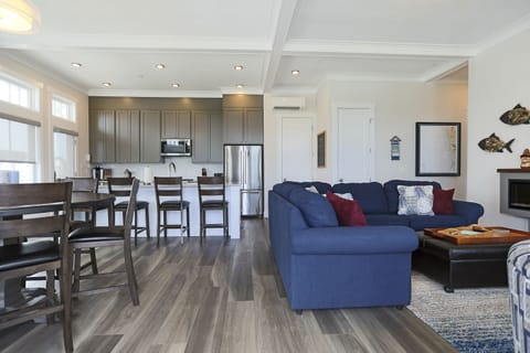 Open-concept kitchen, living and dining rooms