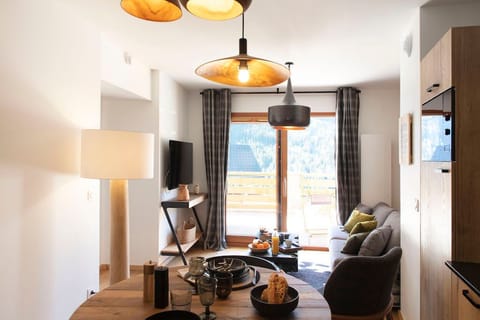 Curl up on the couch  and watch a movie in our living area.