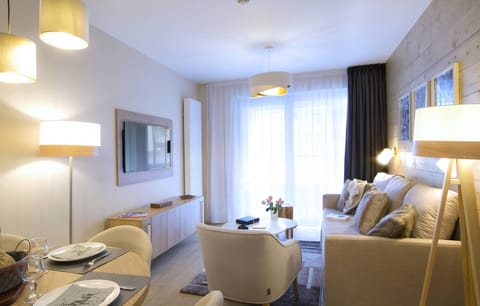 Snuggle up with a cup of coffee or tea on the comfortable sofa.