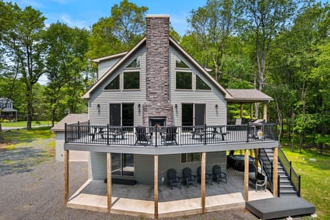 Chalet Style Home with Two Sided Fireplace and Large Deck