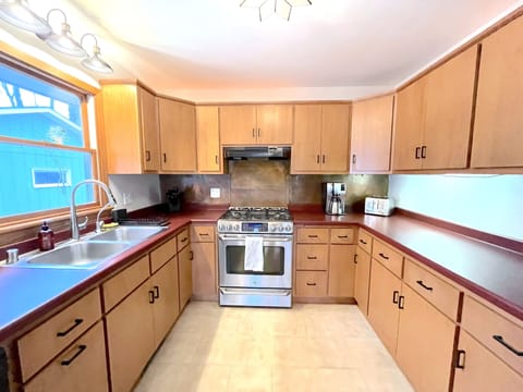 Open kitchen - full-size and fully stocked, lots of counter-space. 