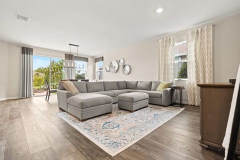 Experience the simple pleasures of a cozy evening spent in the living area while watching a movie