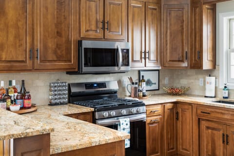 Our kitchen is fully equipped with the necessary tools to create a delicious meal of your own design! Pots, pans, dishes and glasses all ready for you to whip up something special - even kid-friendly options. Bon Appétit! Spices included.