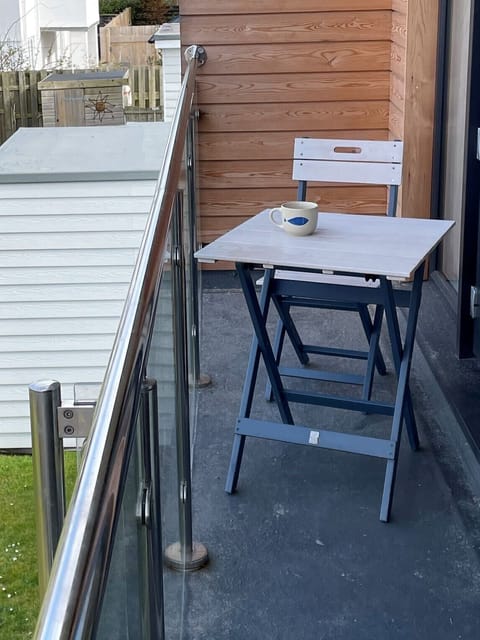 Enjoy a coffee & the views from the balcony upstairs.