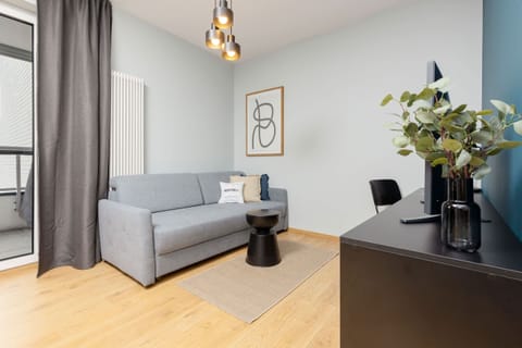 A cozy living room with modern furniture and soft lighting.

