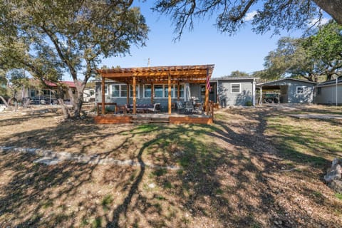 Back Patio with plenty of seating and a space to relax outdoors!