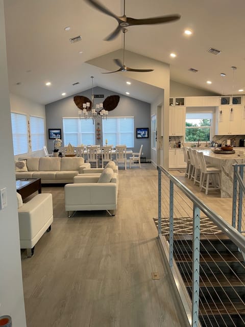 Open concept living room, dining room and kitchen.