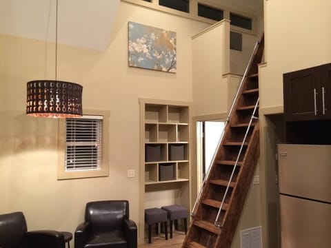 Loft ladder to Access Upstairs Lounging and Sleeping Space