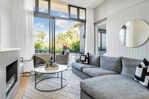Sumptuous lounge with parkland views fireplace