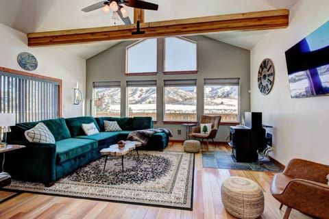 stunning views from living room - green velvet couch doubles as queen size bed