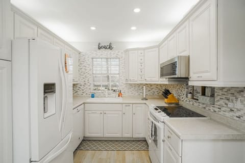 Conveniently labeled kitchen cabinets