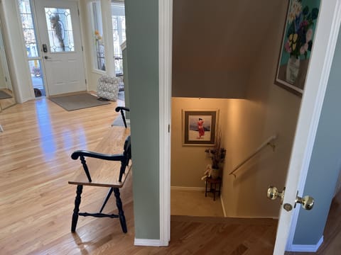 Stairway to suite and front entrance.