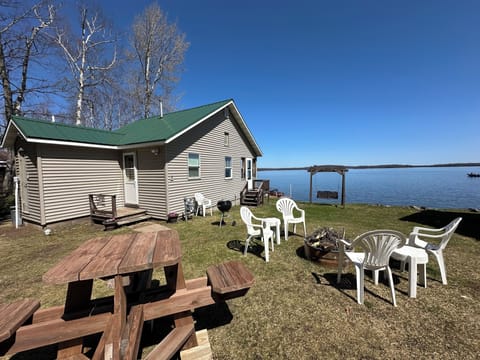 Great outdoor space to enjoy with fire pit, picnic table and grill.
